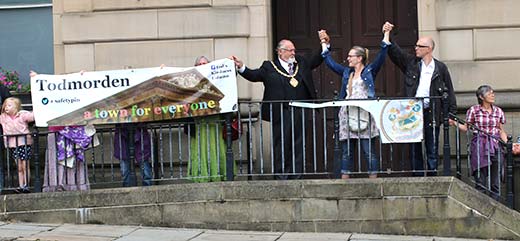 Hands around Todmorden Town Hall